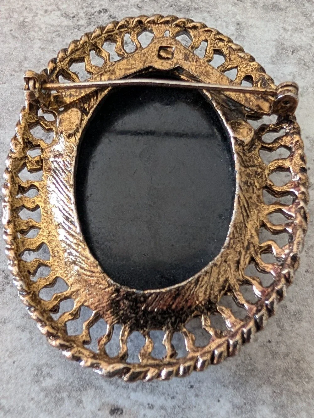 Classic Black and White Cameo Brooch with Gold Frame